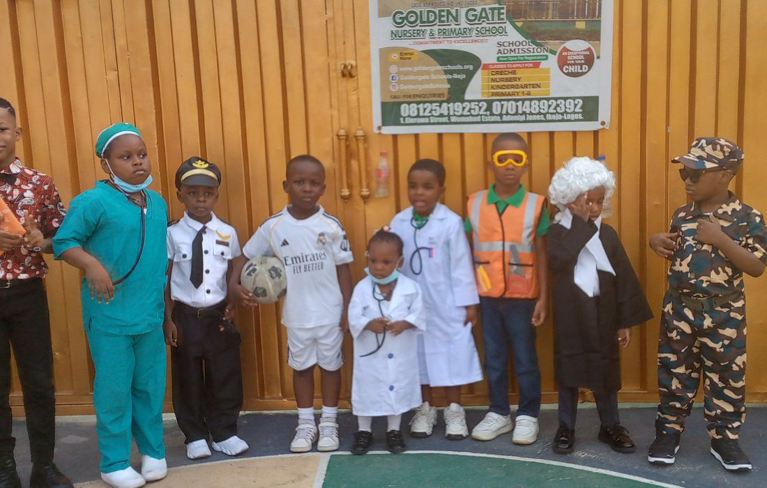 Golden Gate Schools pupils dressed for Career Day outside the school gate