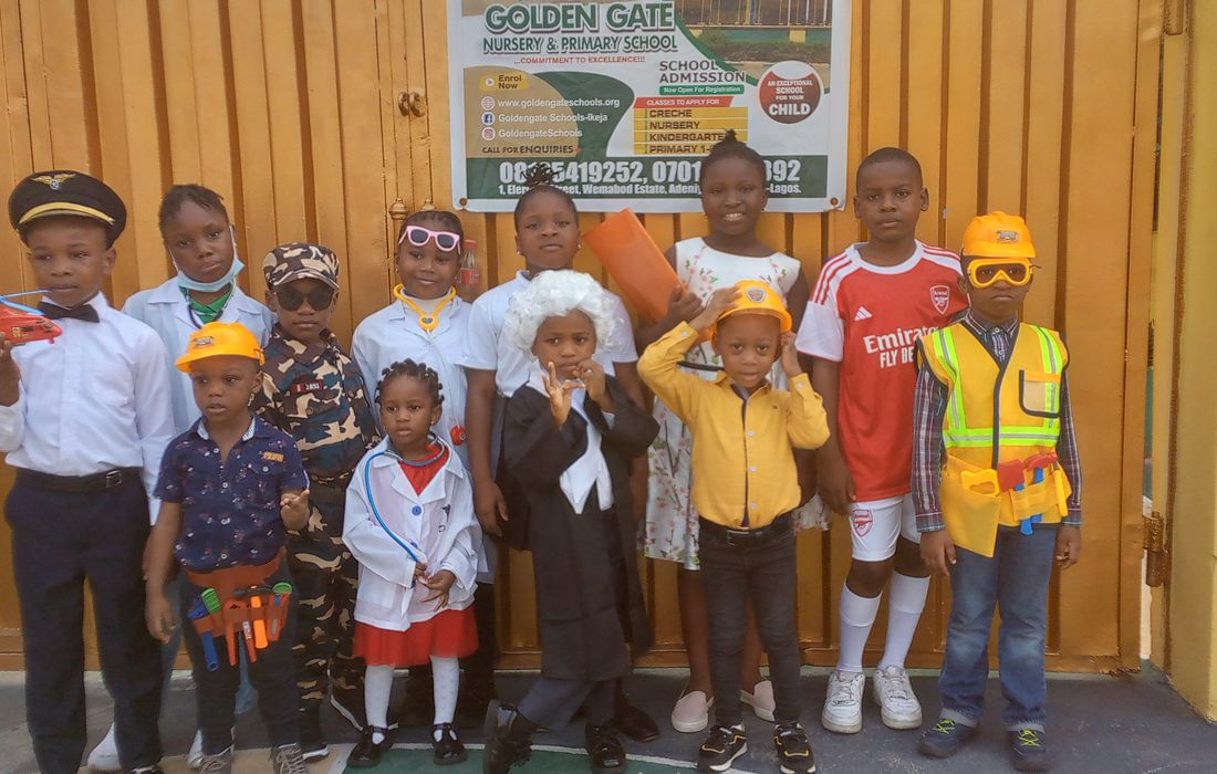 Pupils in career costumes lined up at the school entrance