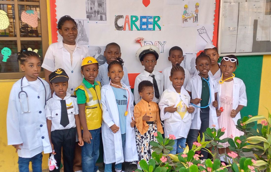 Pupils and their teacher on Career Day in the school garden